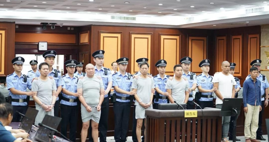 Shanghaiist All six men appearing before the court.